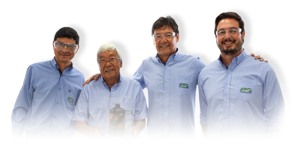 Fábio, Julio and Julio Matino, founder and directors of Juma-Agro, standing with arms crossed